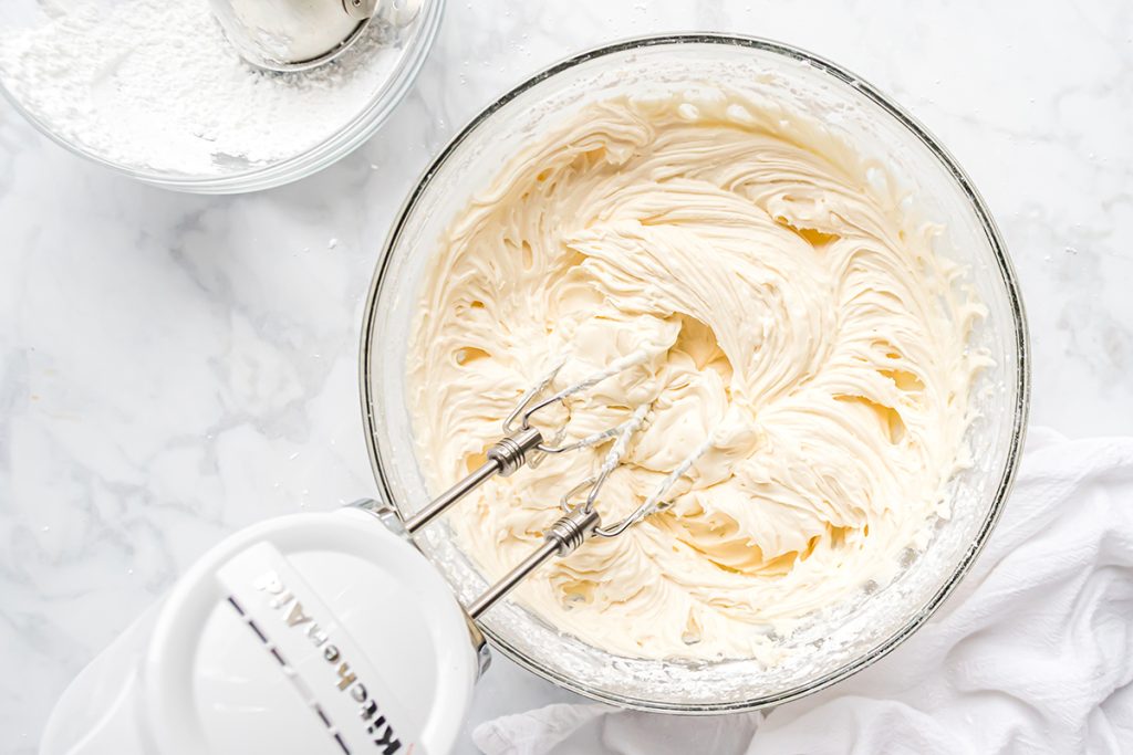 bowl of coconut cream cheese frosting