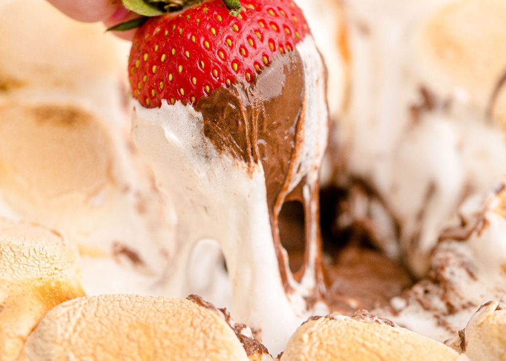 strawberry with melted marshmallow and chocolate 