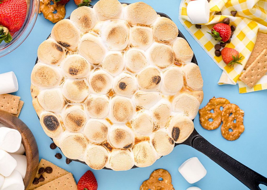 overhead of toasted marshmallows with dippers 