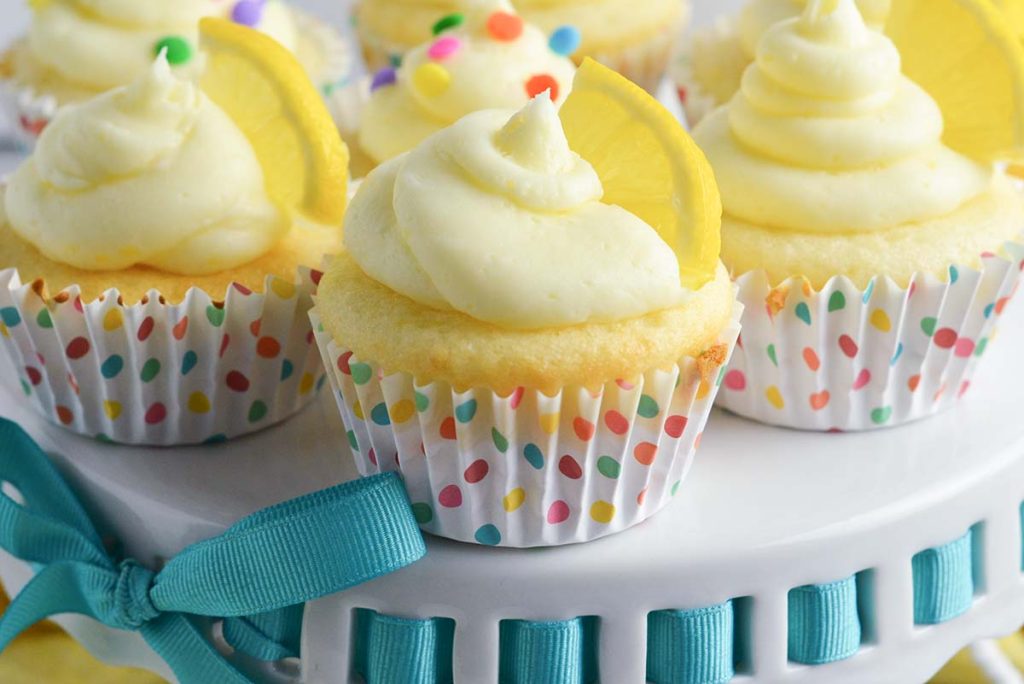 close up of lemon cupcakes on a stand