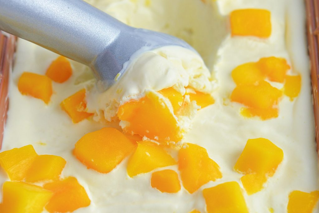 ice cream scoop scooping mango ice cream