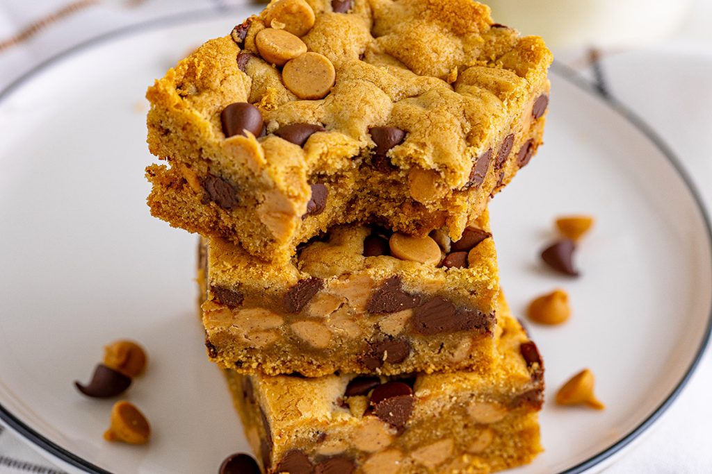 stack of peanut butter chip bars, one with a bite taken out