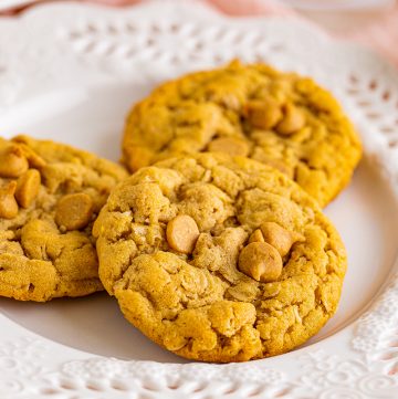 close up of peanut butter oatmeal cookies on a white plate