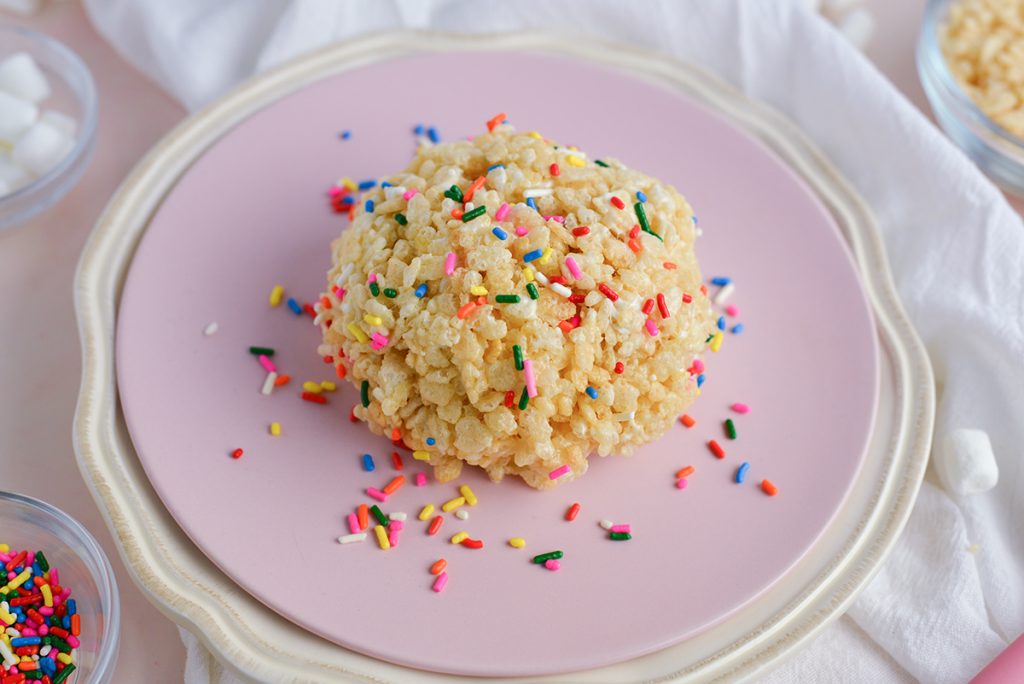 single serve rice krispie treat on a pink plate