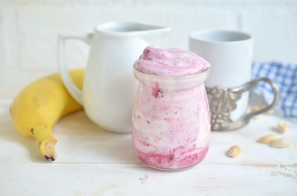 straight on shot of banana split ice cream in a jar