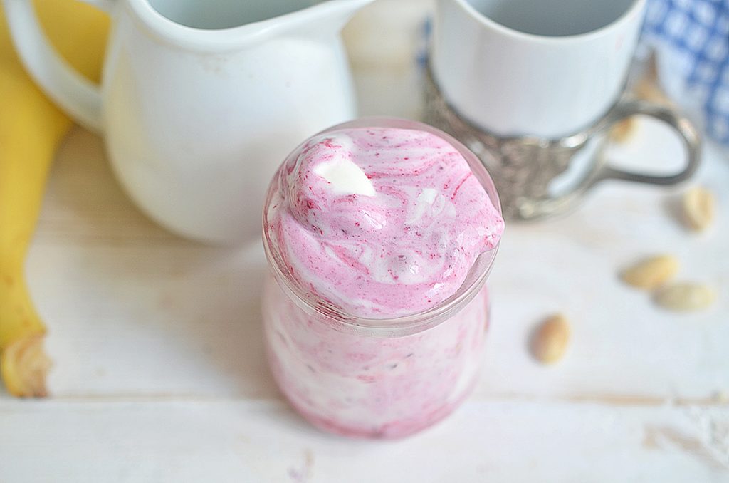 overhead shot of banana split ice cream in a jar