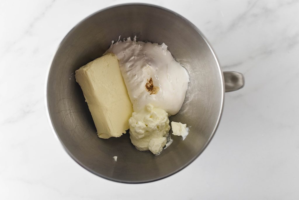 marshmallow fruit dip ingredients in a mixing bowl