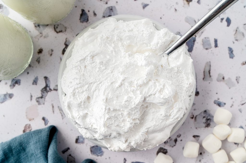 overhead shot of marshmallow fluff in a bowl