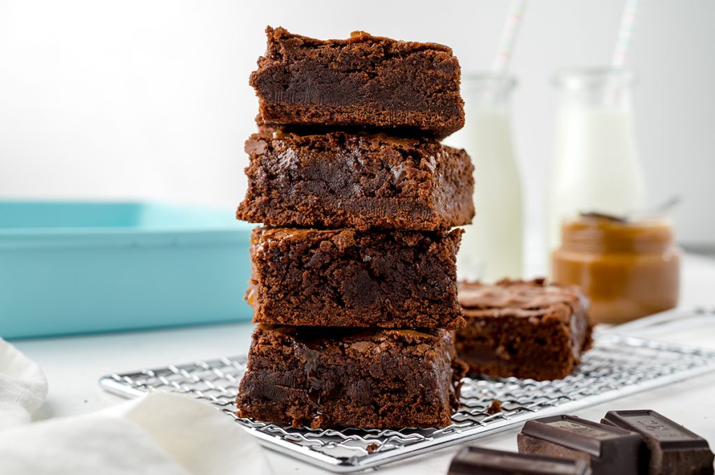 straight on shot of stack of four brownies