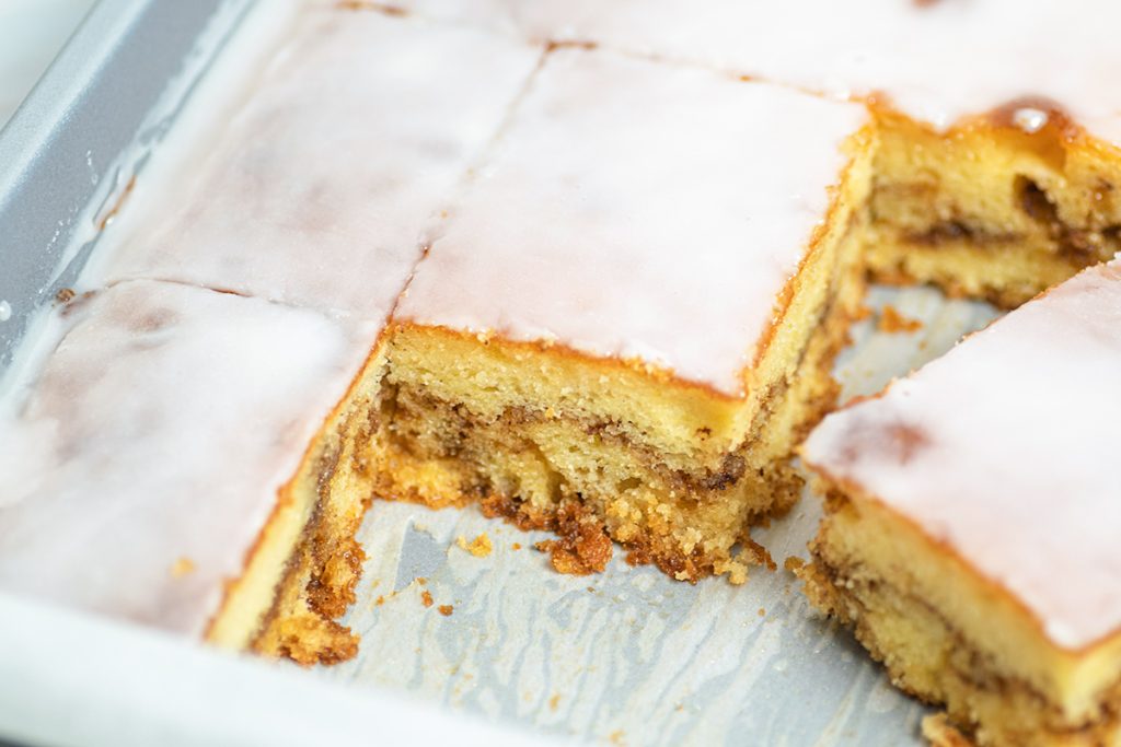 close up of sliced honey bun cake