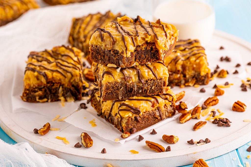 stack of german chocolate brownies with bite taken out