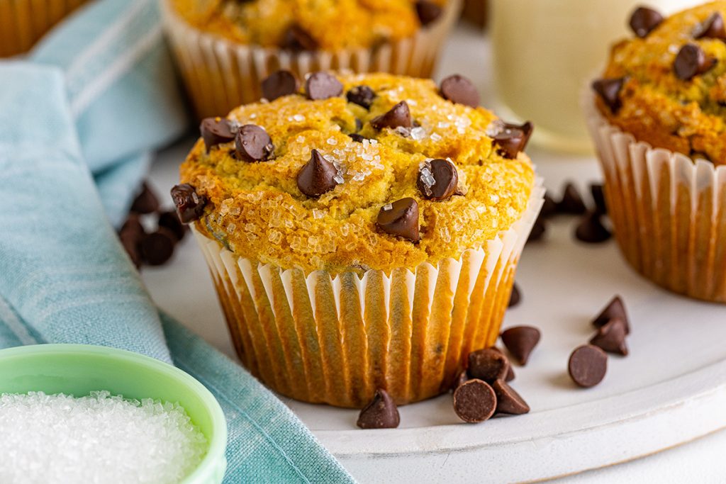 close up of jumbo chocolate chip muffin on tray