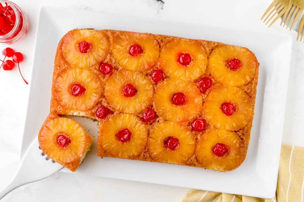 overhead shot of pineapple upside down cake sliced