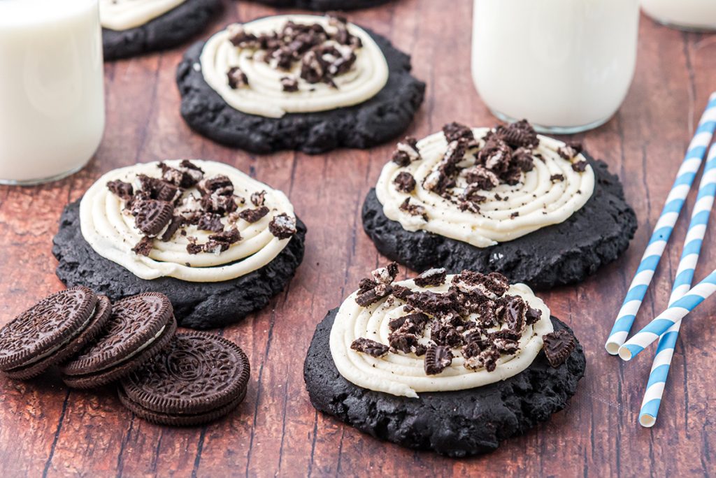 angled shot of four copycat crumbl oreo cookies