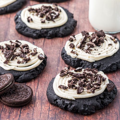 angled shot of four copycat crumbl oreo cookies