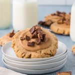 copycat crumbl reeses cookie on stack of plates