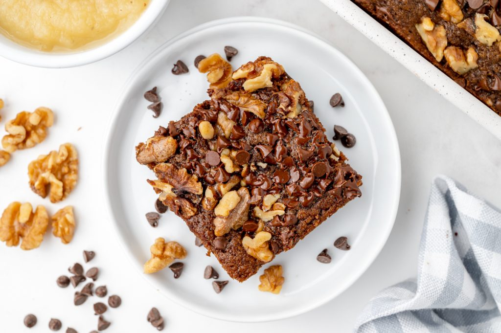 overhead shot of apple sauce brownie on a plate