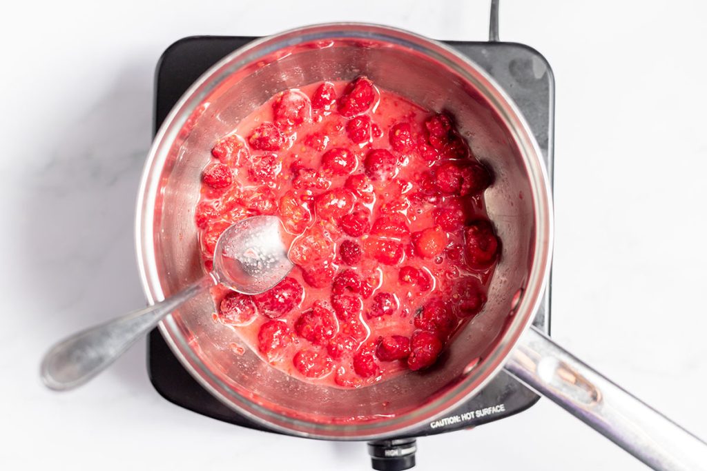raspberries cooking in a pan