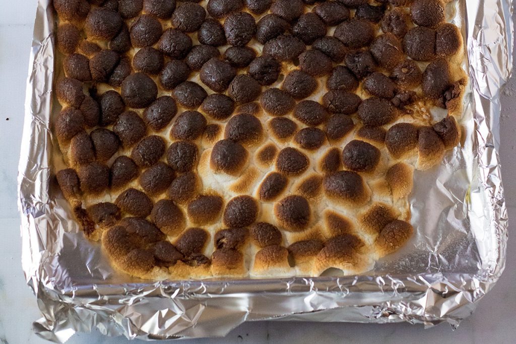 toasted marshmallows on a sheet pan