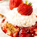 strawberry dump cake on a plate
