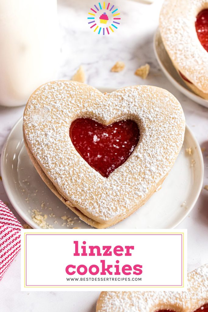 one linzer cookie on a plate with text overlay for pinterest