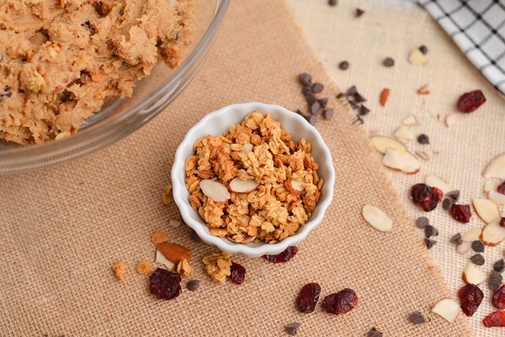 angled shot of small white bowl of granola