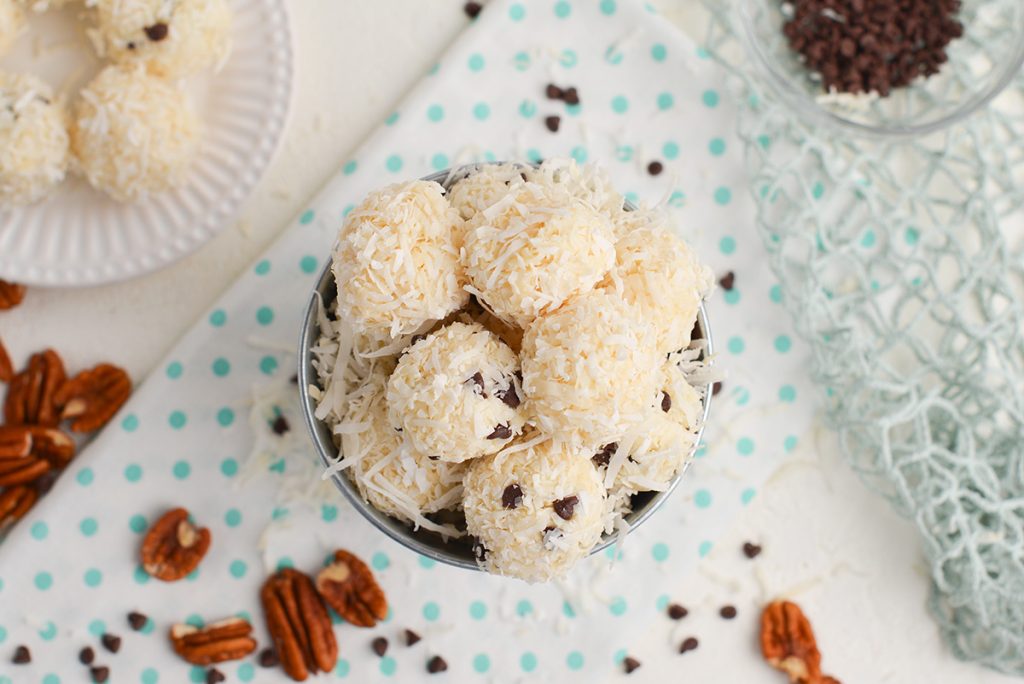 overhead shot of bucket of no-bake coconut balls