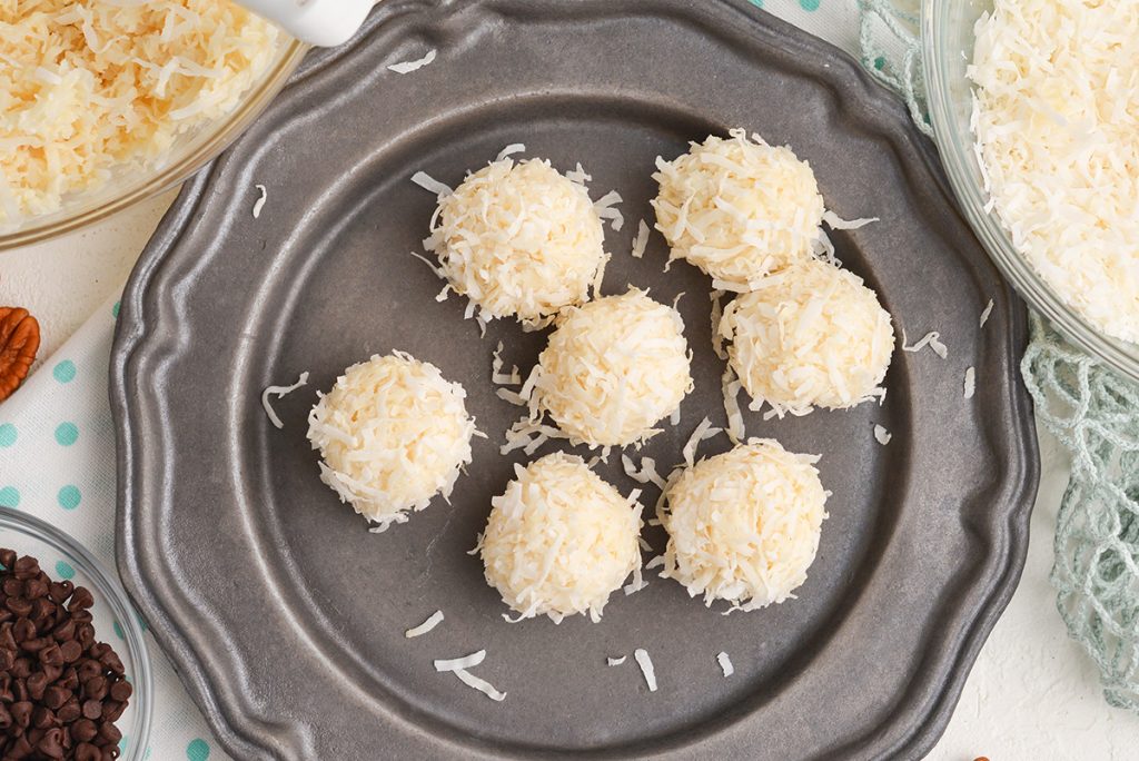 overhead shot of coconut balls on a plate